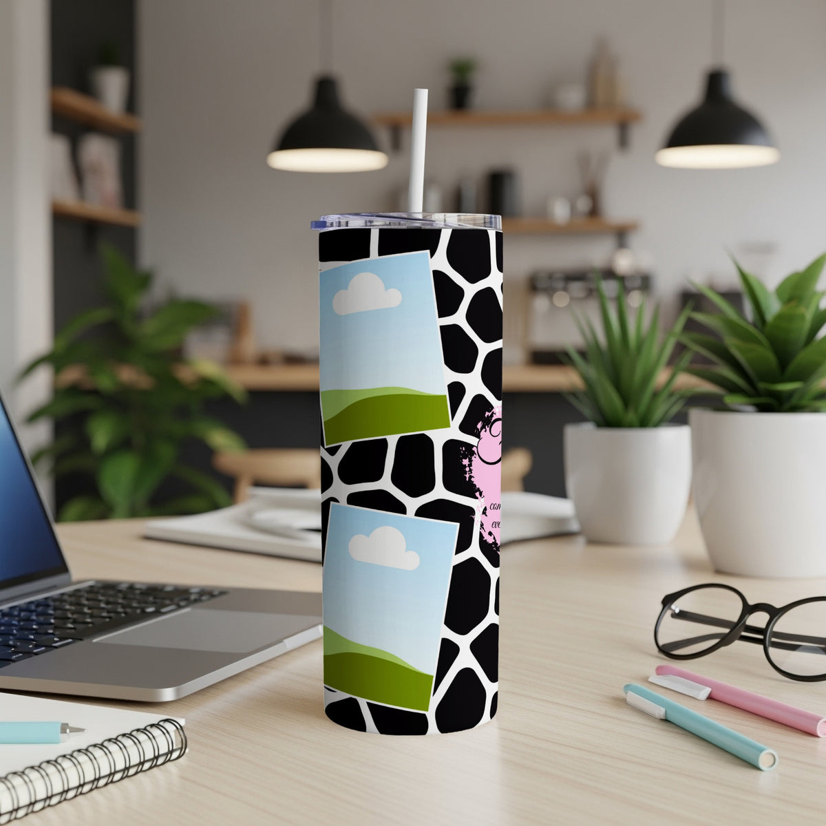 Black and white giraffe print tumbler with two blank photo frames and pink cow graphic.