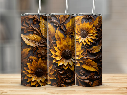 Three tumblers with embossed sunflower and leaf designs on a wooden surface.