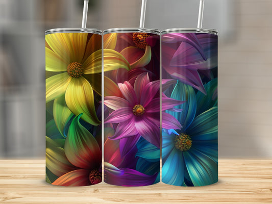 Three tumblers with colorful abstract floral designs on a wooden surface.