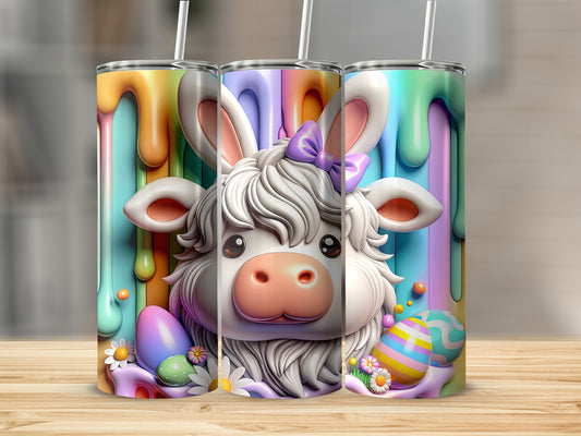 Easter cow with colorful eggs and dripping paint on tumblers.