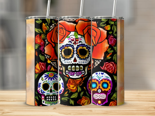 Sugar skull tumblers with floral and dark backgrounds.