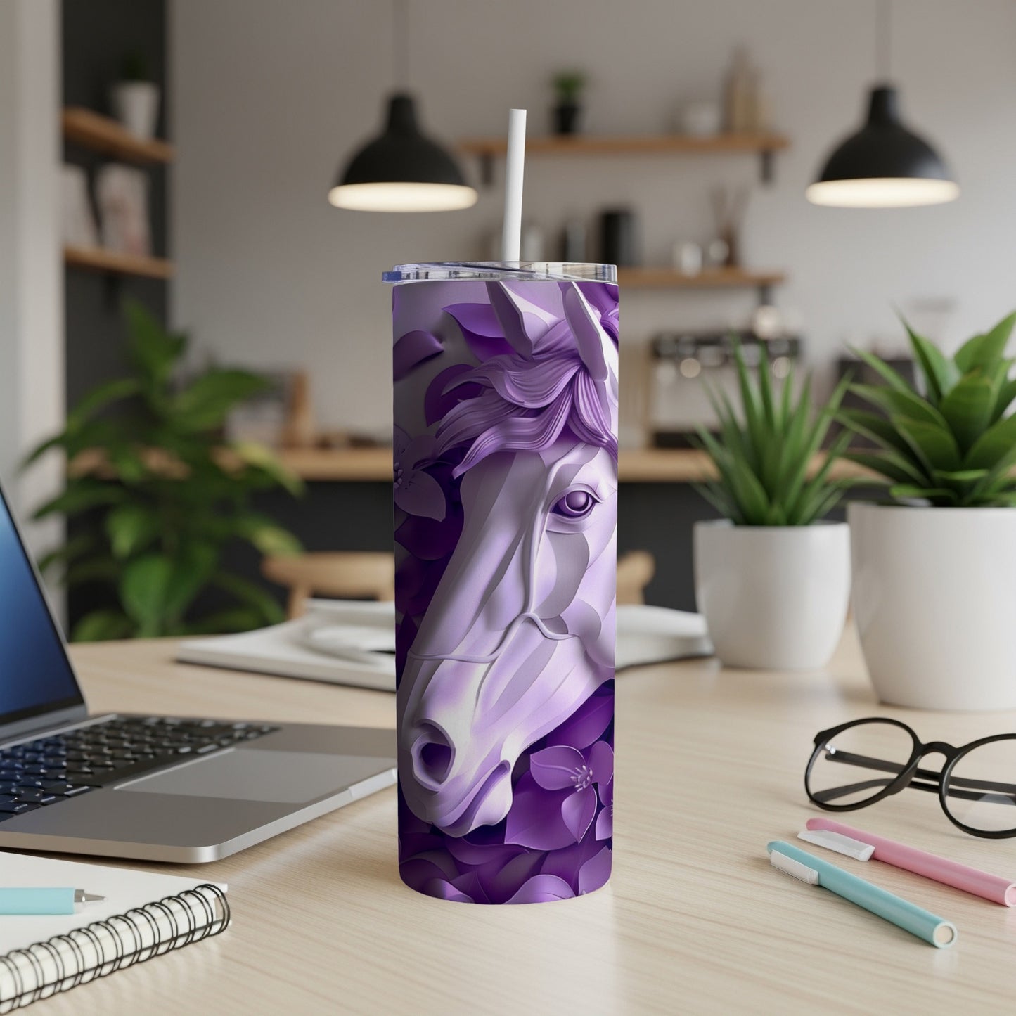 Purple horse head design on a white tumbler with a straw.