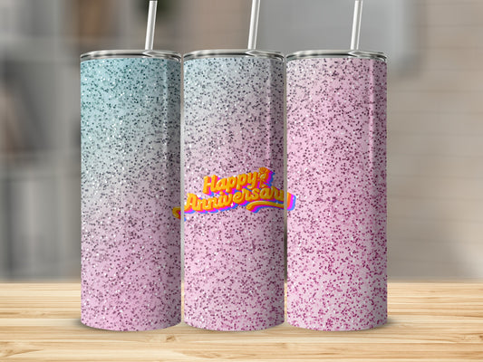 Glitter tumblers with "Happy Anniversary" text on a wooden surface.