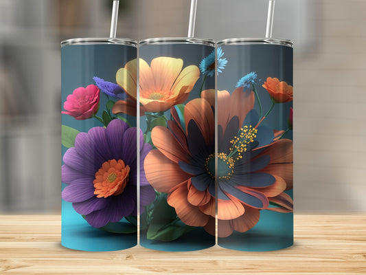 Three tumblers featuring colorful floral designs on a wooden surface.