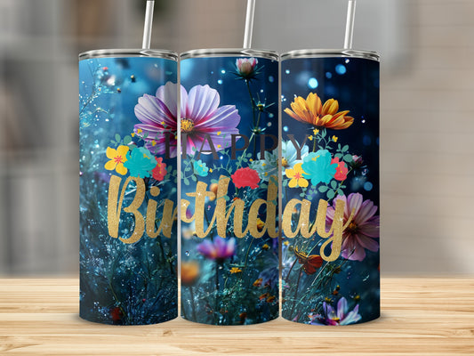 Birthday tumbler with colorful flowers and bokeh lights.