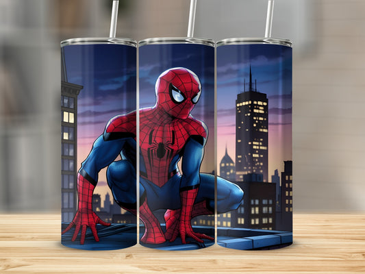 Spiderman crouching on a building rooftop with city skyline at dusk.