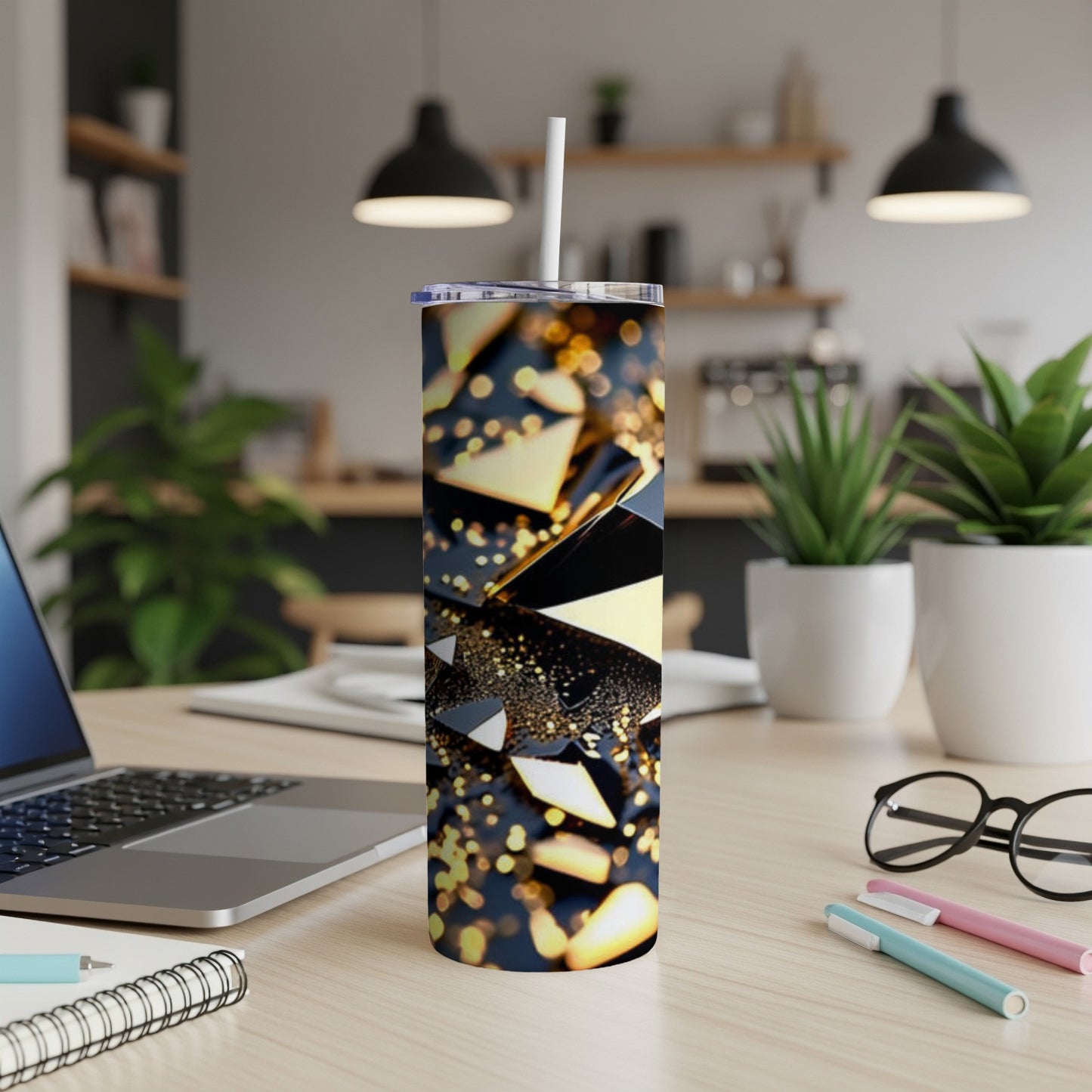 Glittering abstract pattern on a white tumbler with a straw.