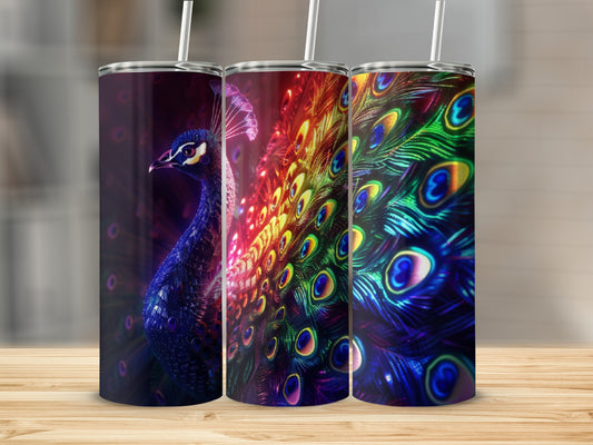 Three tumblers with vibrant peacock feather designs arranged on a wooden surface.