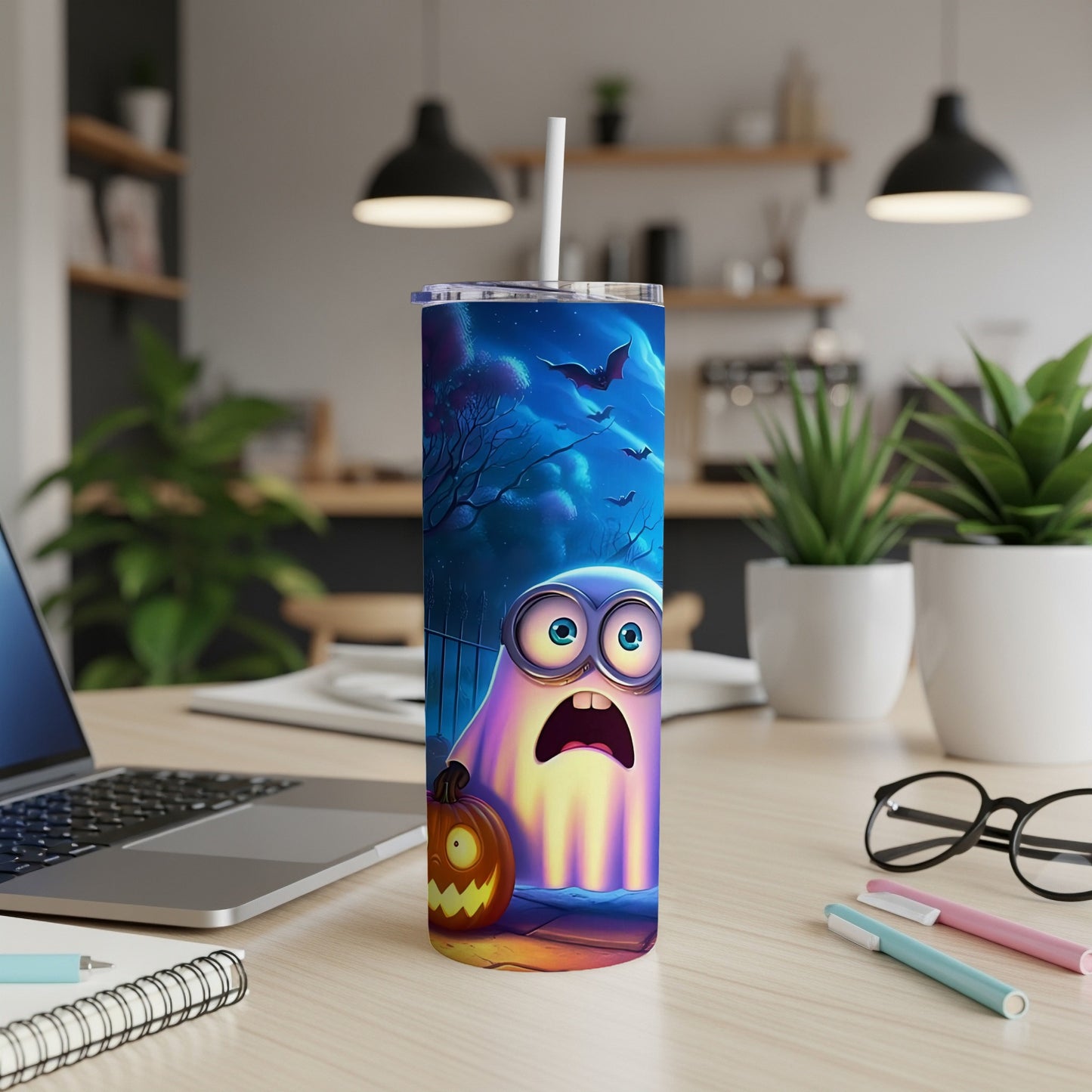 Minion ghost with pumpkin and bats on a Halloween tumbler with straw.