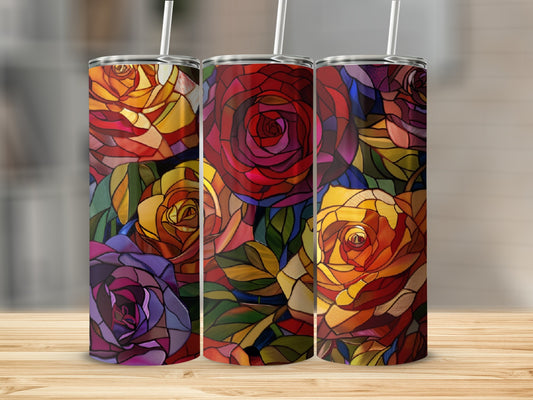 Three tumblers with stained-glass rose patterns displayed on a wooden surface.