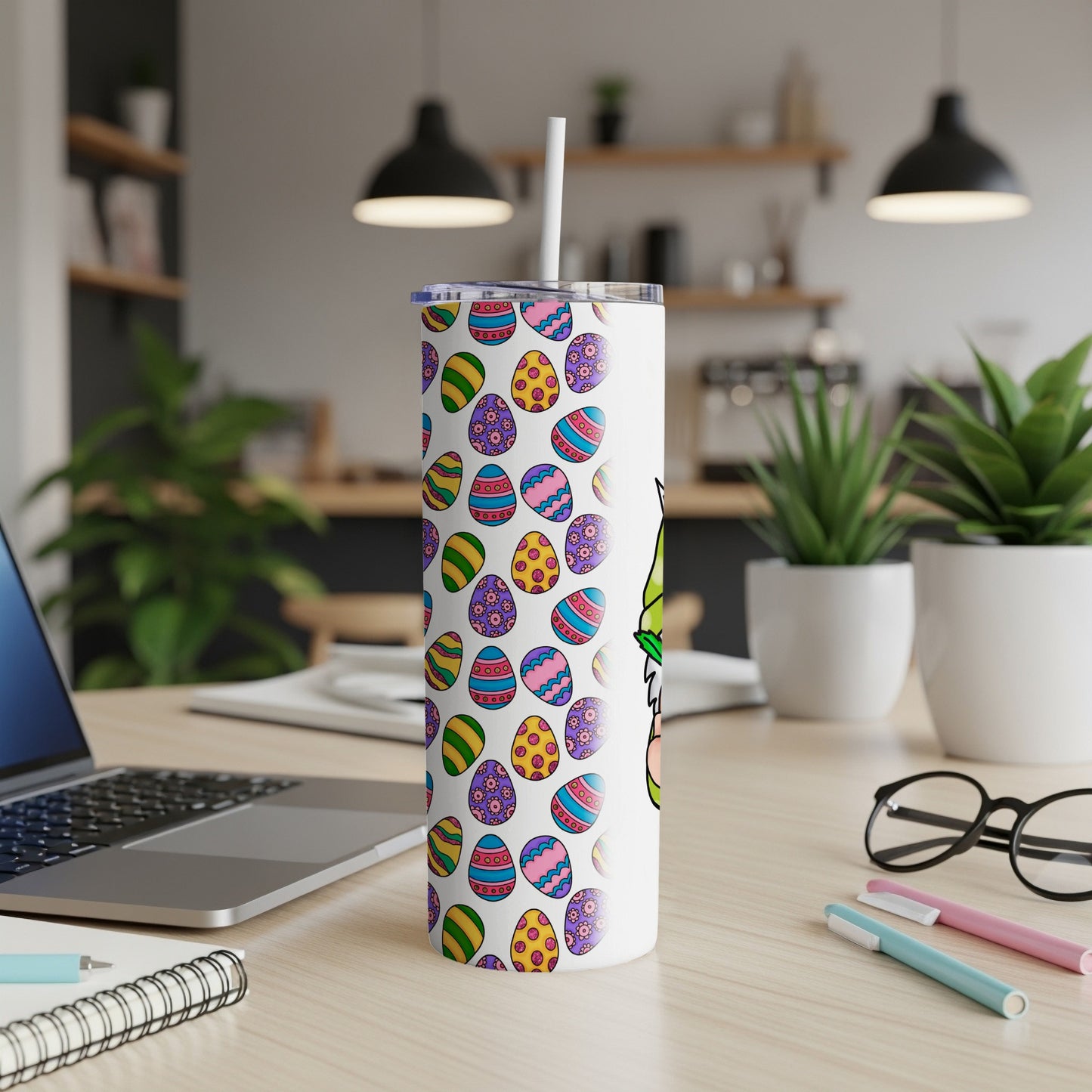 White tumbler with colorful Easter eggs and a gnome graphic.