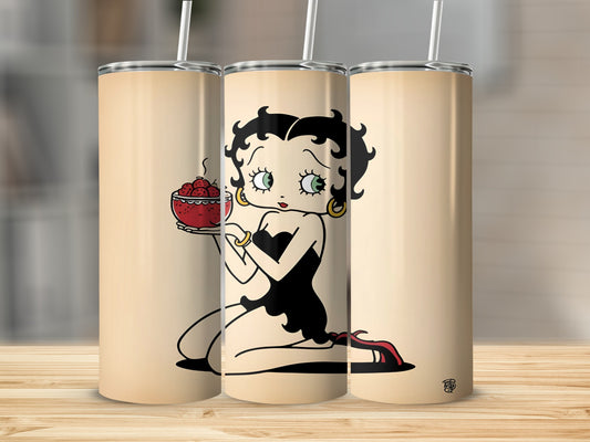 Betty Boop sitting with a bowl of strawberries.