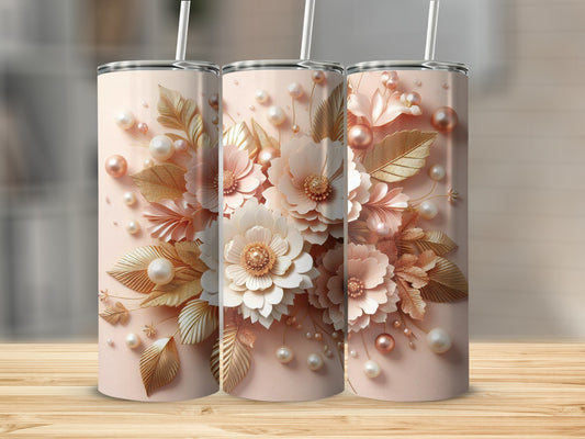 Three tall, slender tumblers with a floral and pearl design on a wooden surface.
