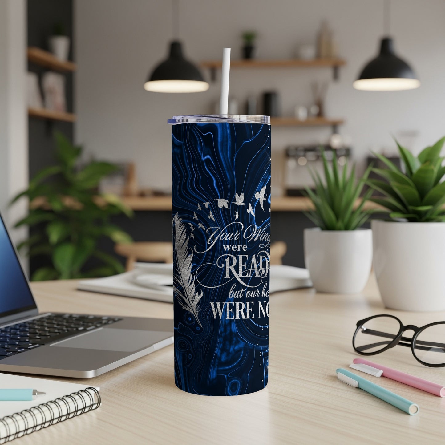 Blue marble patterned tumbler with "Your wings were ready" quote and feather.