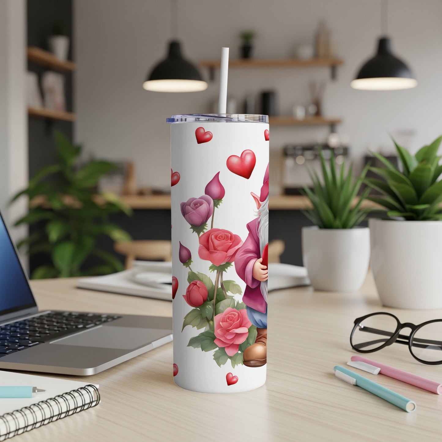 Gnome holding roses on a skinny tumbler with hearts.