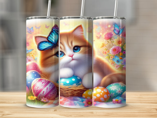 Orange tabby kitten with blue eyes surrounded by Easter eggs and butterflies.