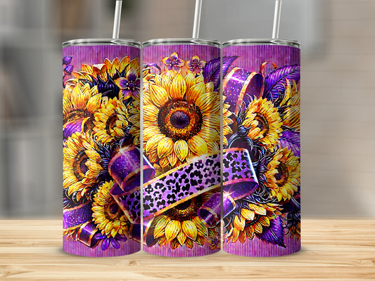 Purple tumbler with sunflowers and leopard print ribbon.