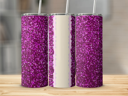 Three glittery purple tumblers with straw on wooden surface.