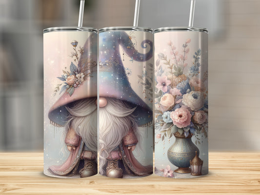 Three decorative tumblers featuring a gnome and floral arrangements.