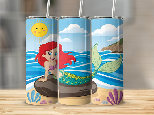 Mermaid with red hair on a rock with a sunny beach background.