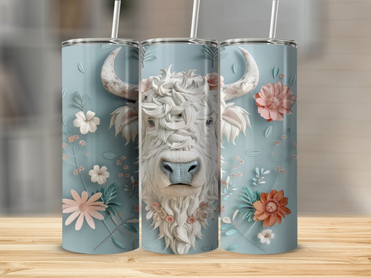Three tumblers with a white bull's face and floral accents on a wooden surface.
