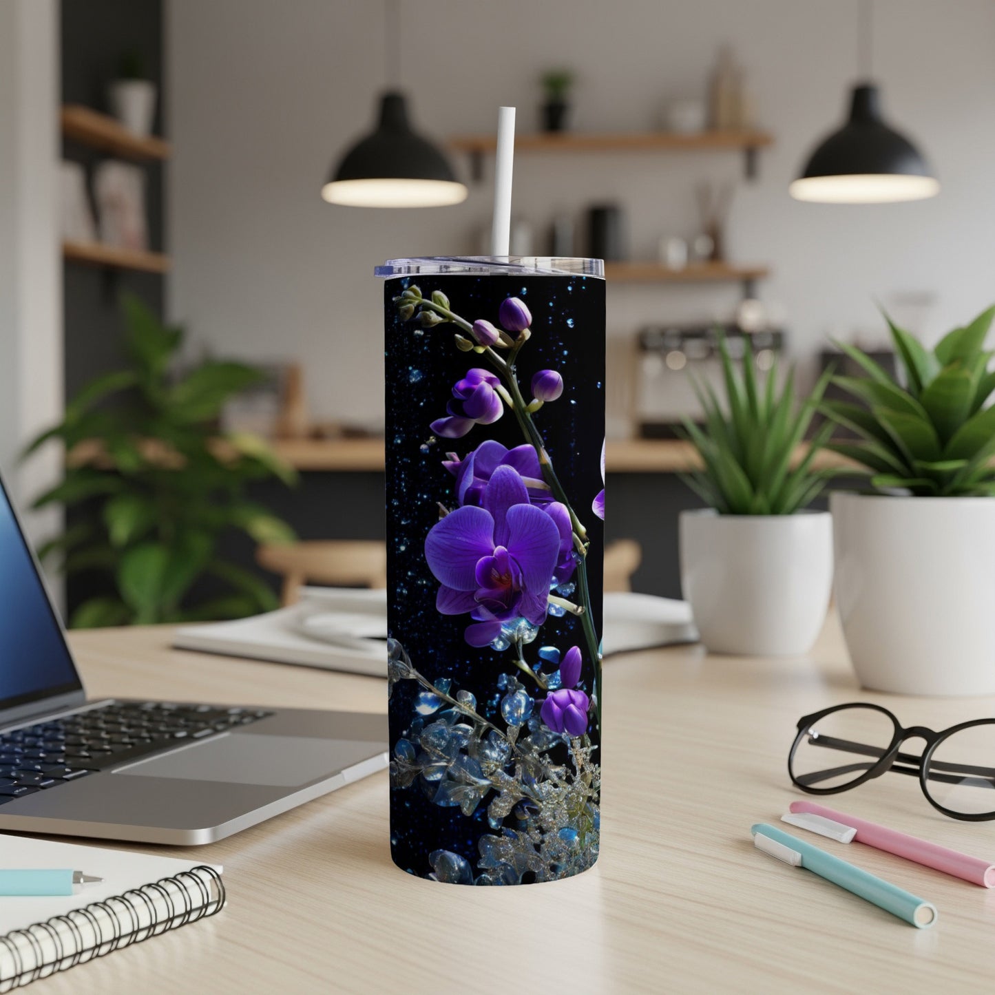 Purple orchids on a dark, textured background adorn a tall tumbler.
