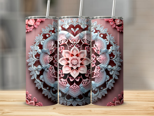 Three tumblers with intricate floral mandala designs in pink and blue.