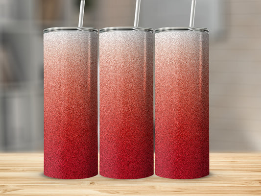 Three tall tumblers with red glitter gradient and white straws.