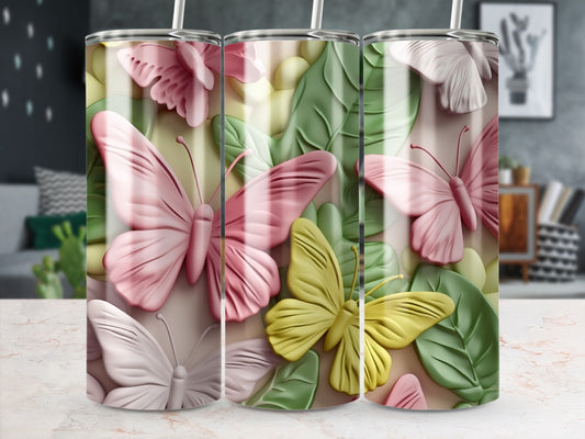 Three tumblers with pastel butterflies and leaves design.