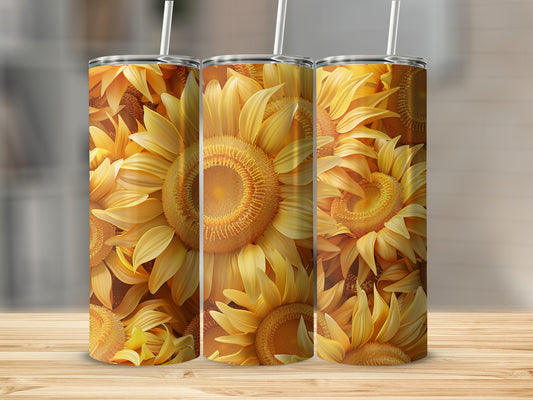 Three tumblers with a close-up sunflower pattern on a wooden surface.