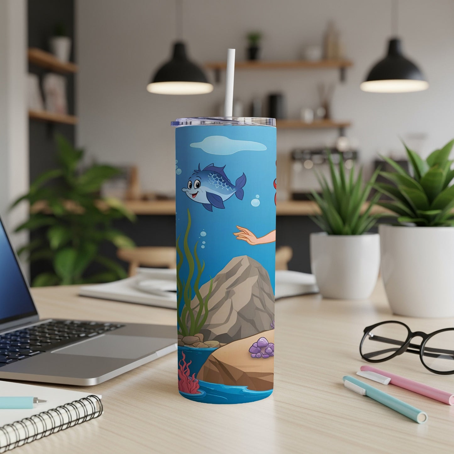Blue and pink tumbler with cartoon fish and coral underwater scene.