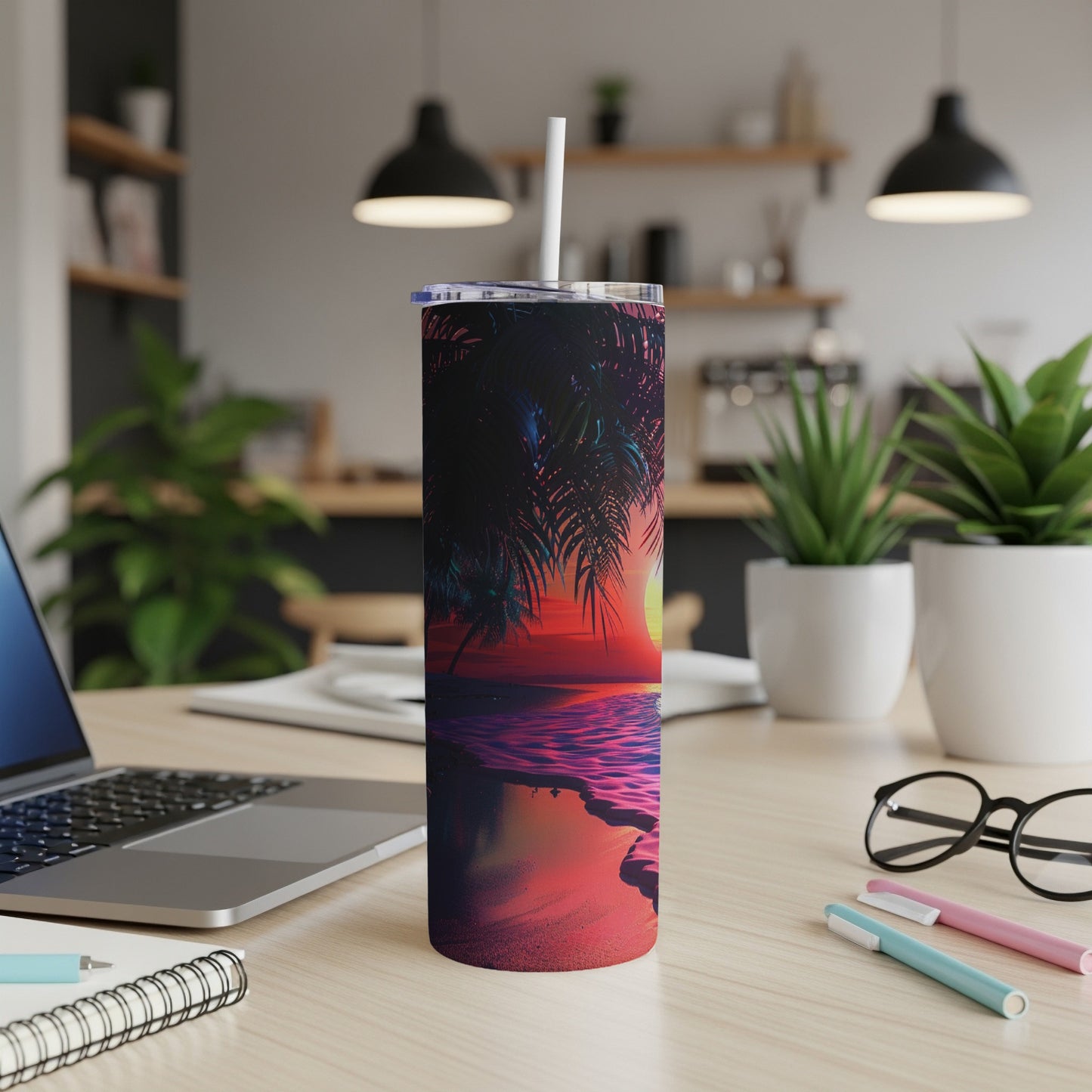 Tumbler with a vibrant sunset beach scene and palm trees.