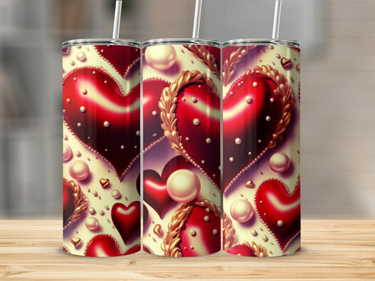 Three tumblers with a repeating heart and pearl pattern.