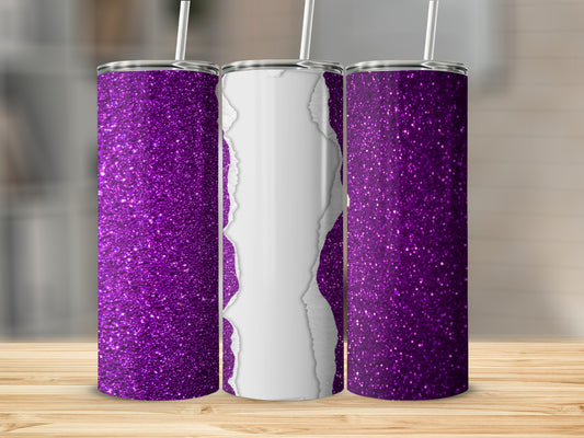 Three purple glitter tumblers with a torn paper design and straws on a wooden surface.