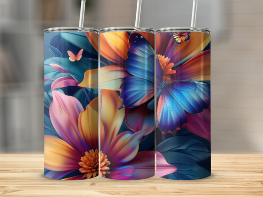 Three tumblers with a vibrant floral and butterfly design.