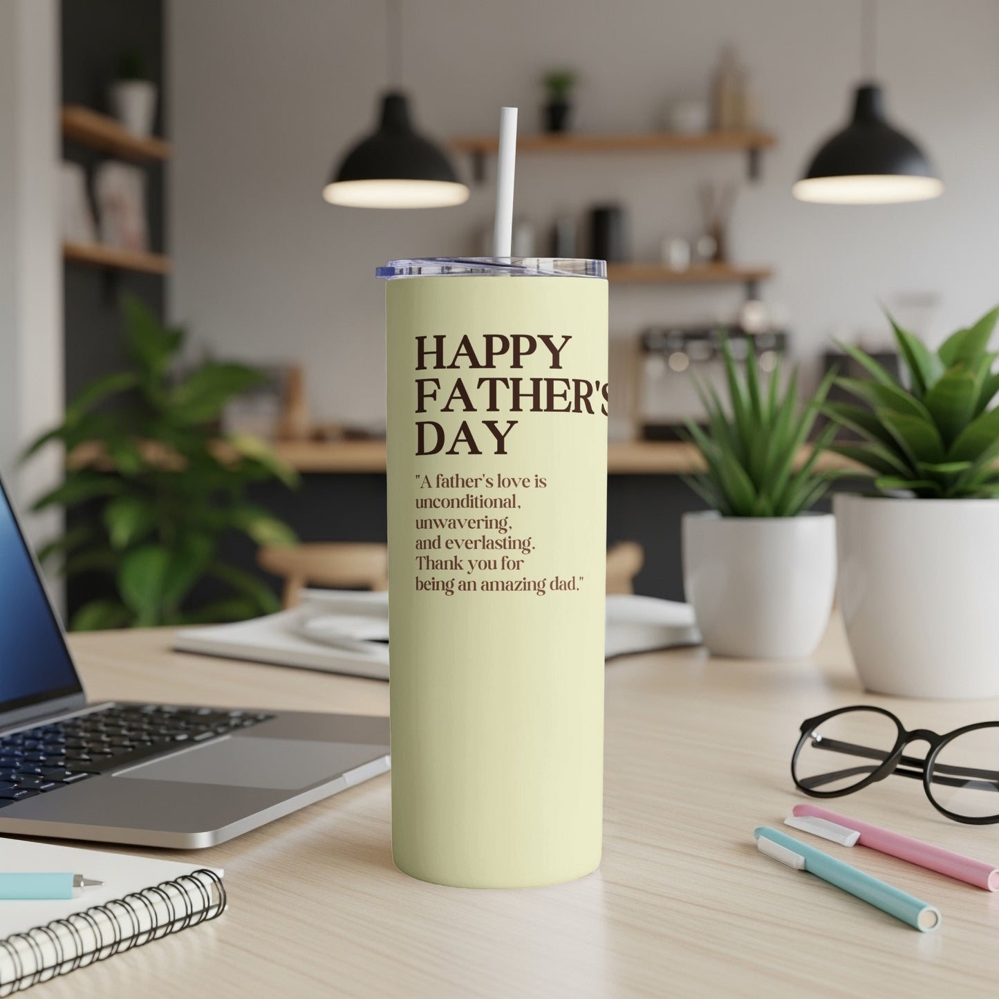 Pale yellow tumbler with "Happy Father's Day" and a quote about a father's love.