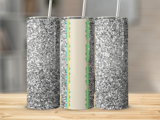 Three glitter tumblers, one with a colorful abstract stripe design.