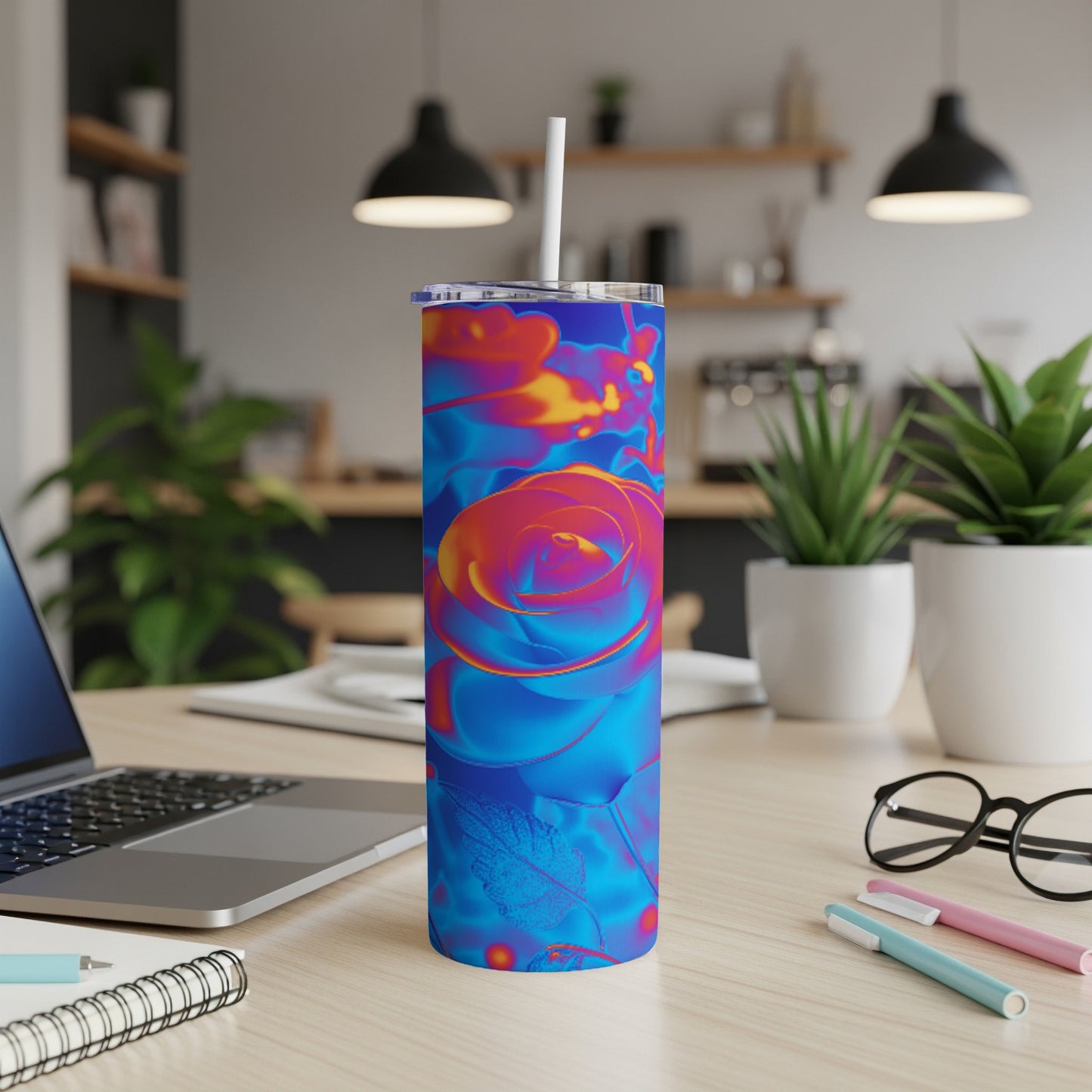 Tumbler with a vibrant blue and orange rose design.