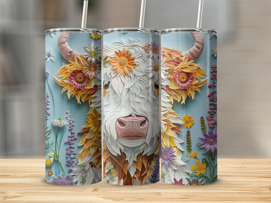 Highland cow with floral mane and tail, on a blue background.