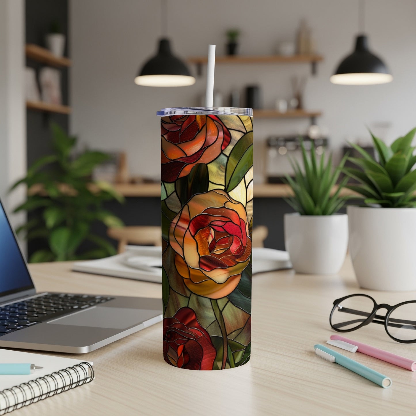 Stained glass tumbler with a vibrant rose pattern.