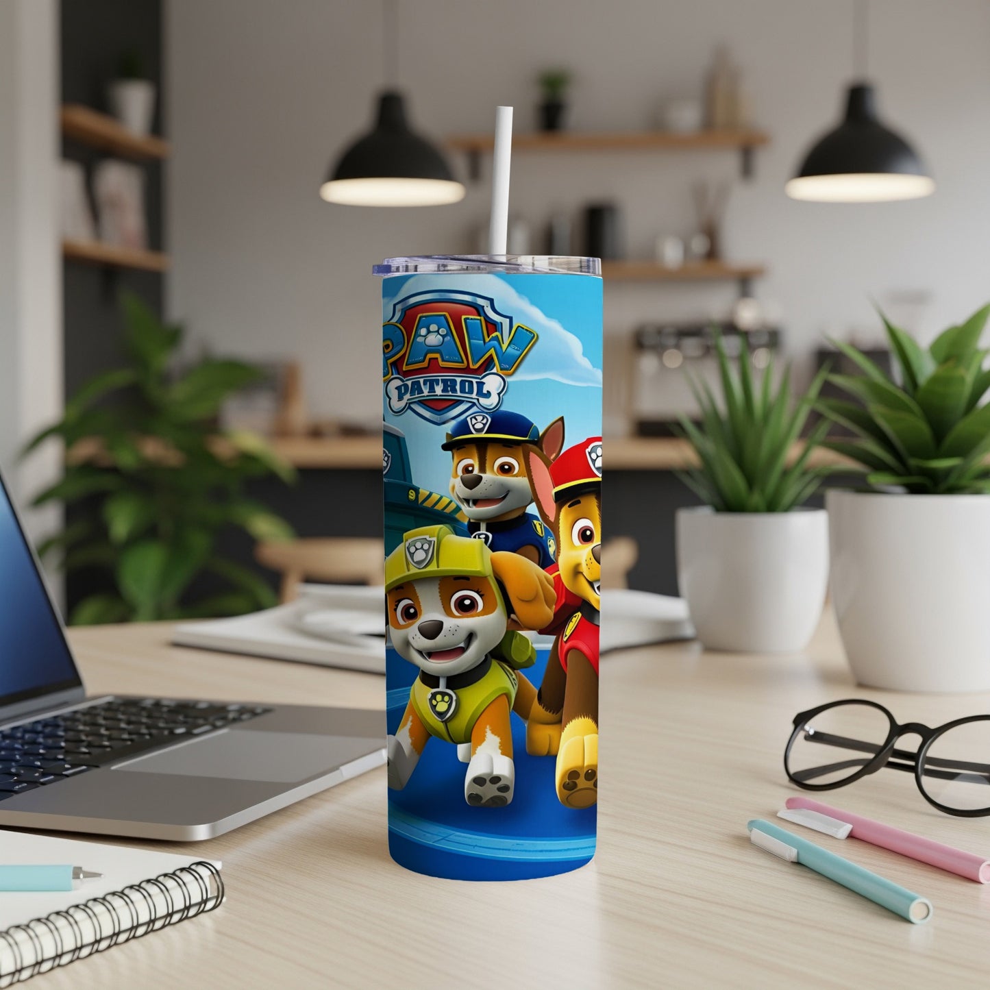 Paw Patrol characters Chase, Marshall, and Rubble on a blue background.
