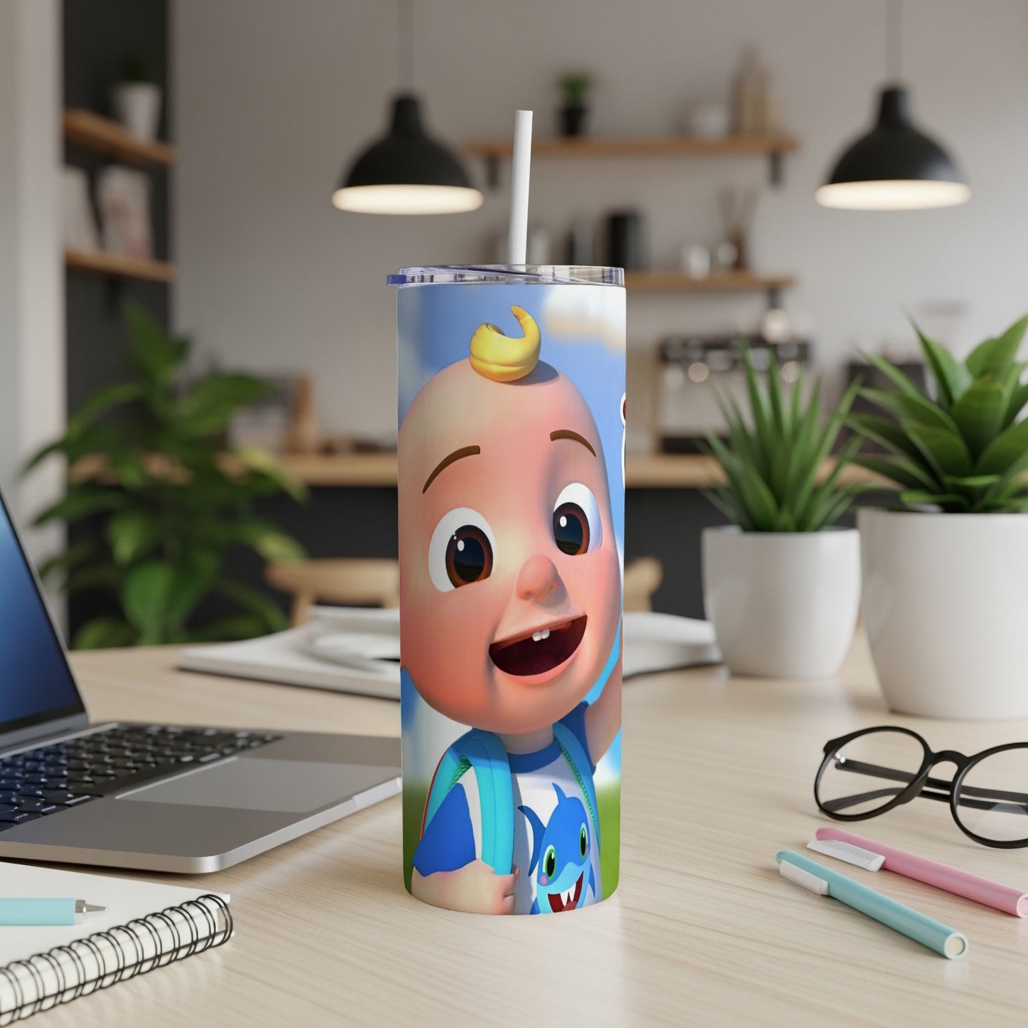 Cocomelon character JJ with a blue backpack on a tumbler.