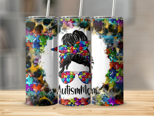 Autism Mom tumbler with colorful puzzle piece design and sunglasses.