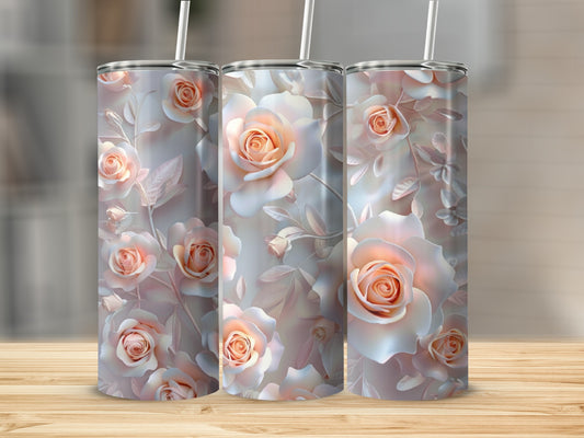Three tumblers with a rose floral pattern and white straws.