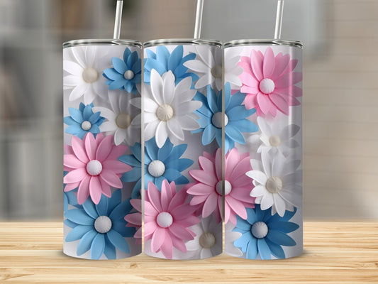 Three tall tumblers with a repeating daisy floral pattern in pink, blue, and white.