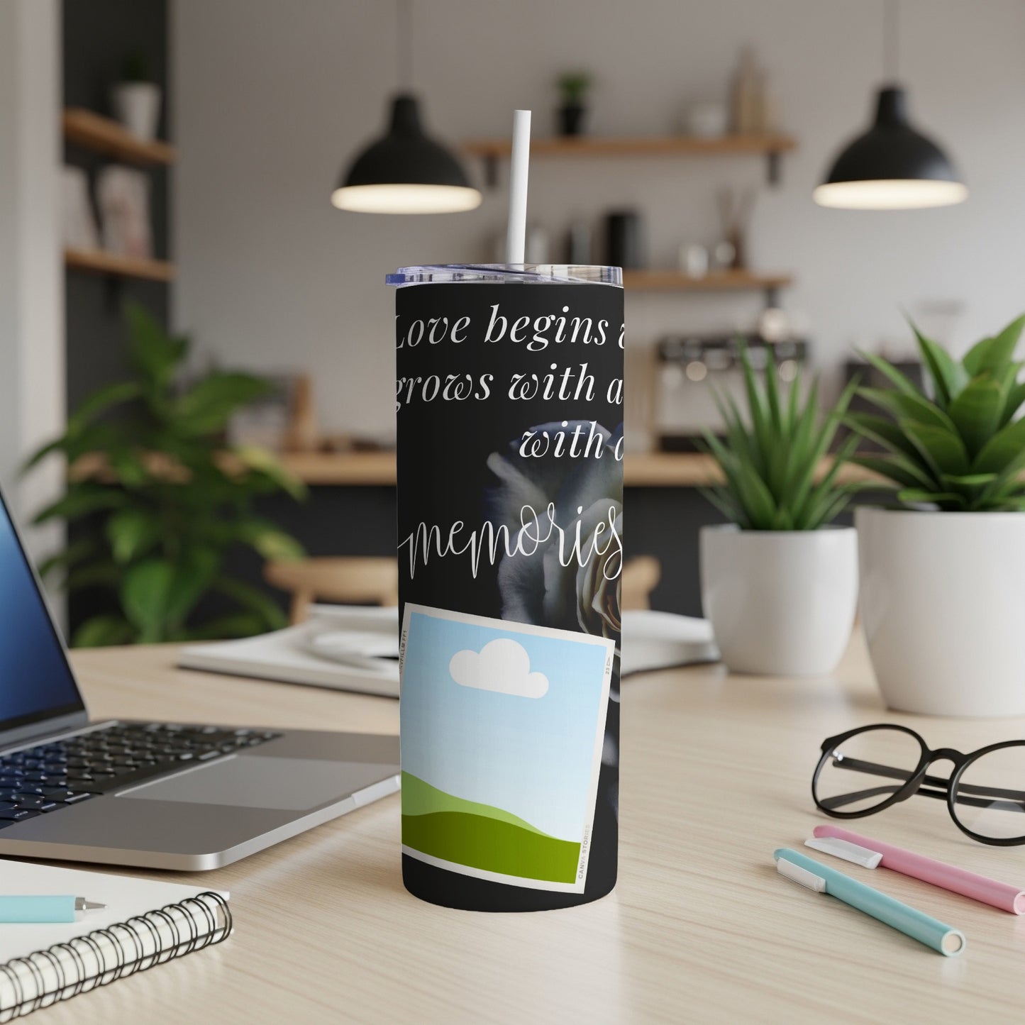 Black tumbler with white text: "Love begins a...rows with a...with o memories" and a picture placeholder.
