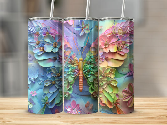 Three tumblers with colorful butterfly and floral designs.