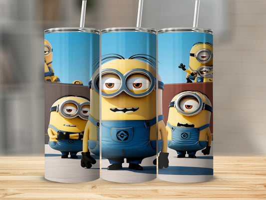 Three Minions wearing blue overalls stand in front of a blurred background.
