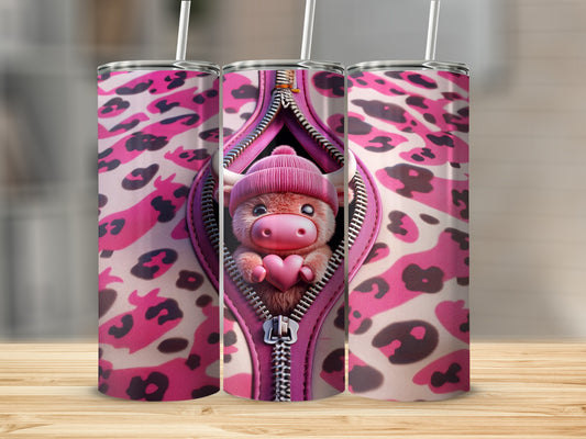 Pink leopard print tumbler with zipper revealing cute cow character.