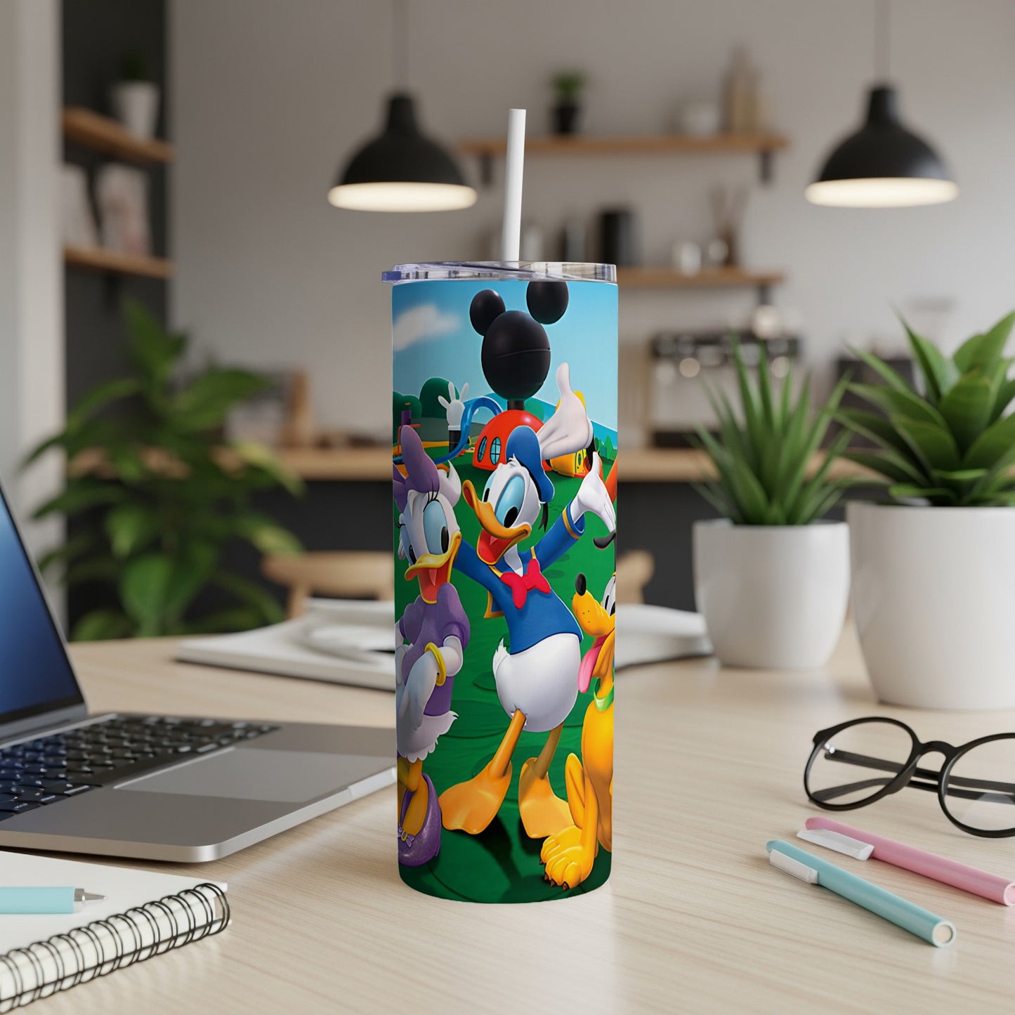 Mickey, Minnie, Donald, Daisy, and Pluto cartoon characters on a tumbler.